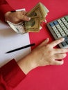 hand of a businesswoman holding american dollars banknotes Royalty Free Stock Photo