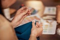 Hand, button and sewing with a woman designer working in fashion with a material or textile product. Creative, table and Royalty Free Stock Photo