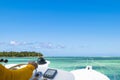 Hand of captain on steering wheel of motor boat in the blue ocean during the fishery day. Success fishing concept. Ocean yacht. Royalty Free Stock Photo