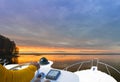 Hand of captain on steering wheel of motor boat in the blue ocean during the fishery day. Success fishing concept. Ocean yacht. Royalty Free Stock Photo