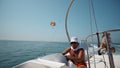 Hand of captain on steering wheel of motor boat on parasail adrenaline tour