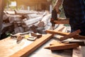 Hand of Carpenter drills wood a hole with an electrical drill Royalty Free Stock Photo