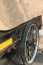 Hand-cart with jute, wooden structure and circle wheel tire Royalty Free Stock Photo