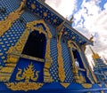 Hand-carved golden ornamentation of Blue Temple or Wat Rong Suea Ten at Chiang Rai Thailand