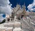 Hand Carved Thai oriental Architectural wonder white Temple at Chiang Rai