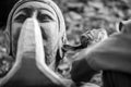 Hand of carver carving wood in blackand white color tone Royalty Free Stock Photo