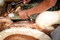 Hand of carver carving wood