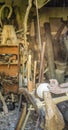 Hand carving a wooden bowl with a foot powered wood lathe, in an old carpenter`s workshop Royalty Free Stock Photo