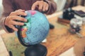 Hand catch and Finger point Globe, whole world.Travel , Adventure and Discovery concept Royalty Free Stock Photo