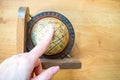 Hand catch and Finger point Globe, whole world. Travel, Adventure and Discovery Royalty Free Stock Photo