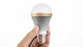 Hand catch LED light bulb Royalty Free Stock Photo