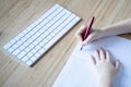 Little girl writing with fountain pen in her notebook Royalty Free Stock Photo