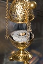 Hand censer with burning incense on hot charcoal inside Royalty Free Stock Photo