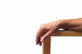 Hand on chair armrests
