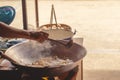 A hand chef make Fried rice sticks with shrimp in street food Royalty Free Stock Photo