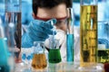 Hand of Chemical engineer pipetting samples with syringe pipette in the research laboratory