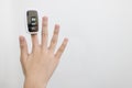 Hand of child girl with fingertip pulse oximeter on finger for examination of the lung disease,checking for Coronavirus COVID-19 Royalty Free Stock Photo