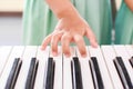 Hand children playing keyboards Royalty Free Stock Photo