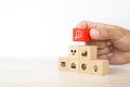 Hand choose cube wooden block stack with the key on business strategy icon with graph and arrow bullseye of strategic plan and mar Royalty Free Stock Photo