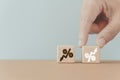 Hand choose up arrow wood cube ,left arrow down for changes interest rates, risk management , refinance, increasing sale Royalty Free Stock Photo