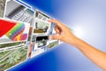 Hand choosing image from images stream Royalty Free Stock Photo