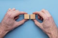 Hand choosing a wooden block from a set. Business choice concept Royalty Free Stock Photo