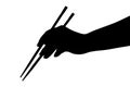 Hand with chopsticks Royalty Free Stock Photo