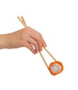 Hand with chopsticks taking philadelphia roll, sushi, isolated on white Royalty Free Stock Photo