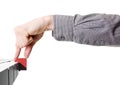 Hand chosing red (different) cube. Royalty Free Stock Photo