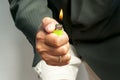 Hand and cigarete lighter Royalty Free Stock Photo