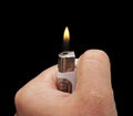 Hand with a cigarette lighter Royalty Free Stock Photo