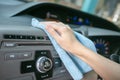 Hand cleaning Interior modern car with Microfiber and cleaning console car Royalty Free Stock Photo