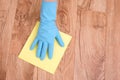 A hand cleaning a parquet Royalty Free Stock Photo