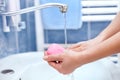 Hand cleaning with soap with runnung water