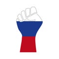 The hand clenched into a fist is raised up and painted in the colors of the flag of Russia. The concept of resistance and durabili