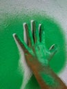 Hand cliche green paint 1