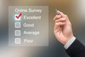 Hand clicking online survey on virtual screen