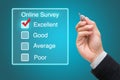 Hand clicking online survey on virtual screen Royalty Free Stock Photo