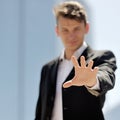 Hand close-up of a young businessman - successful and positive thinking concept Royalty Free Stock Photo