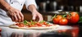 hand closeup of chef preparing italian pizza in kitchen. banner Royalty Free Stock Photo