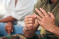 Hand closeup, ring and couple with a divorce, marriage problem or home crisis. House, mental health and a man leaving