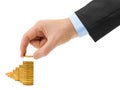 Hand with coin and money stairs Royalty Free Stock Photo