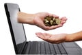 Hand with coins comes out of laptop monitor and pour down coins Royalty Free Stock Photo