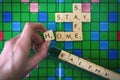 Words forming with Scrabble game letters - stay, safe, home, healthy.