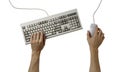 Hand on computer keyboard and mouse isolated on a white background Royalty Free Stock Photo