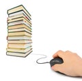 Hand with computer mouse and books Royalty Free Stock Photo