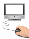 Hand with computer mouse and monitor Royalty Free Stock Photo