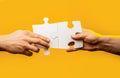 Hand connecting jigsaw puzzle. Business solutions, success and strategy concept. Man hands connecting couple puzzle Royalty Free Stock Photo