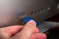 Hand connecting USB Flash drive to laptop computer Royalty Free Stock Photo