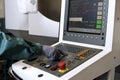 Hand on the control panel of a cnc programmable machine Royalty Free Stock Photo